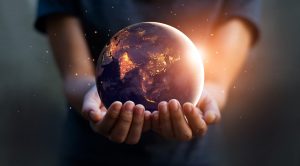 globe held in hands